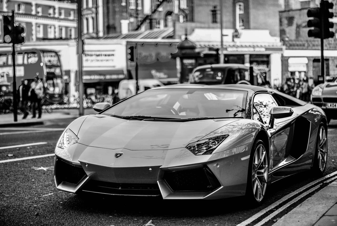 A gray Lamborghini Aventador with a glossy finish